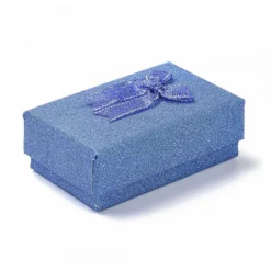 boîte bleu carton avec paillettes décoratives pour un joyeux anniversaire